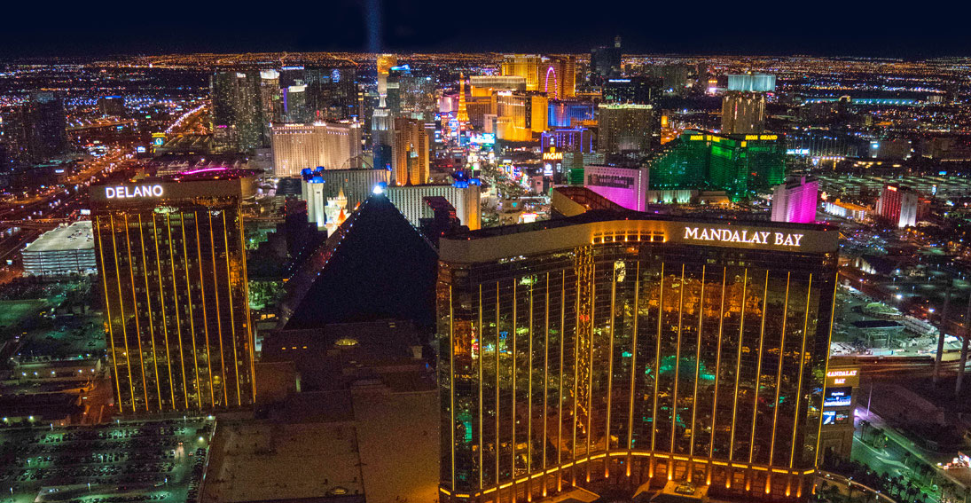 A Las Vegas Strip wedding with iconic hotels and neon lights creating an amazing backdrop to the night