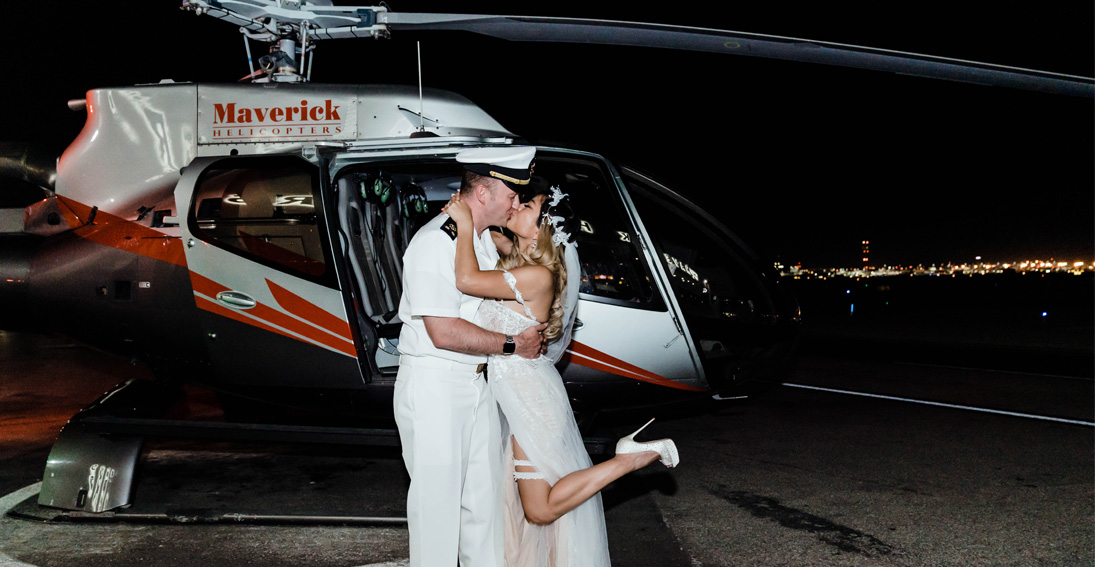 Officer and a bride seal their nuptials with a kiss